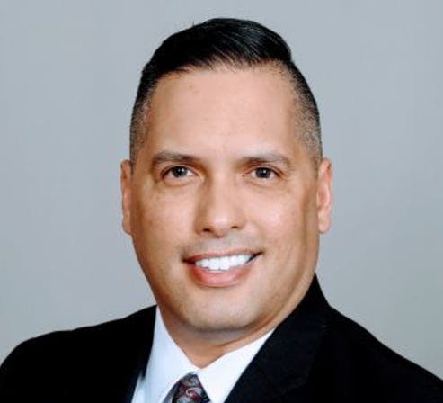 Headshot of Davin Magno Licensed Professional Counselor