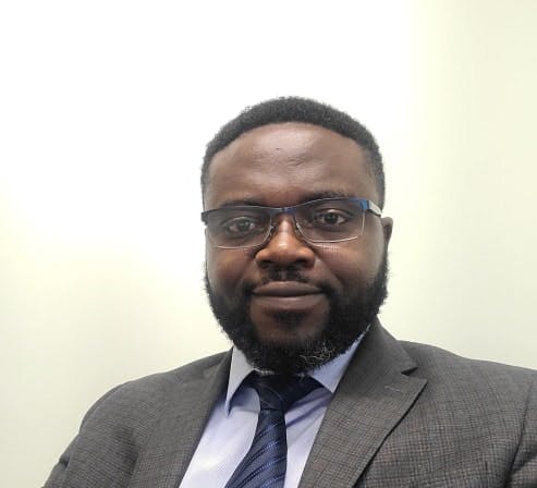 Headshot of Olusola Olawale PMHNP
