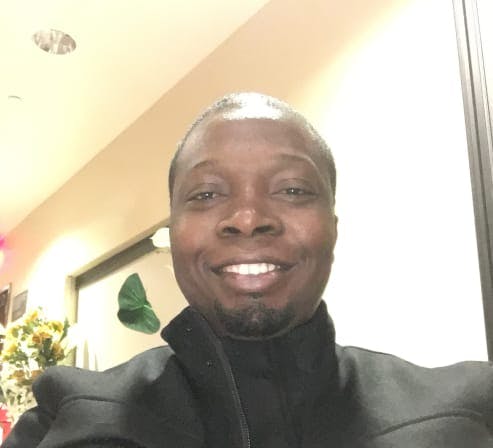 Headshot of Tony Akpengbe Psychiatric-Mental Health Nurse Practitioner