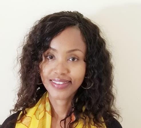 Headshot of Regina Macharia Psychiatric-Mental Health Nurse Practitioner