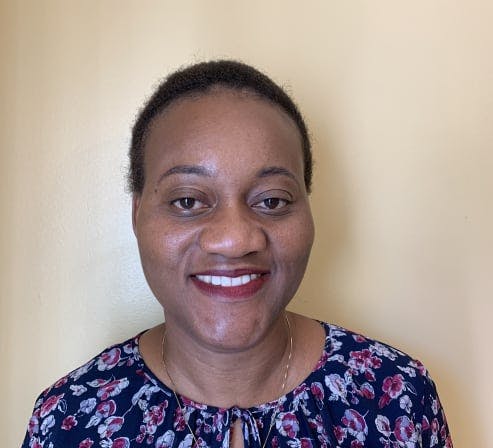 Headshot of Toyin Adekunle Psychiatric-Mental Health Nurse Practitioner