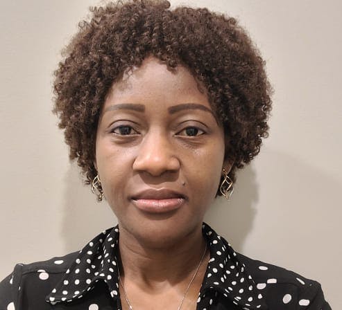Headshot of Esther Adedokun Psychiatric-Mental Health Nurse Practitioner