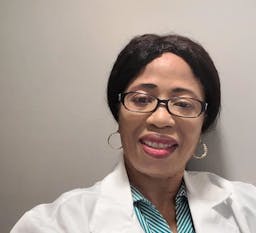 Headshot of Tit Anjorin Psychiatric-Mental Health Nurse Practitioner