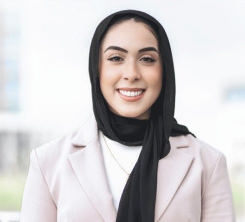 Headshot of Rania Qashmar, Licensed Professional Counselor Associate